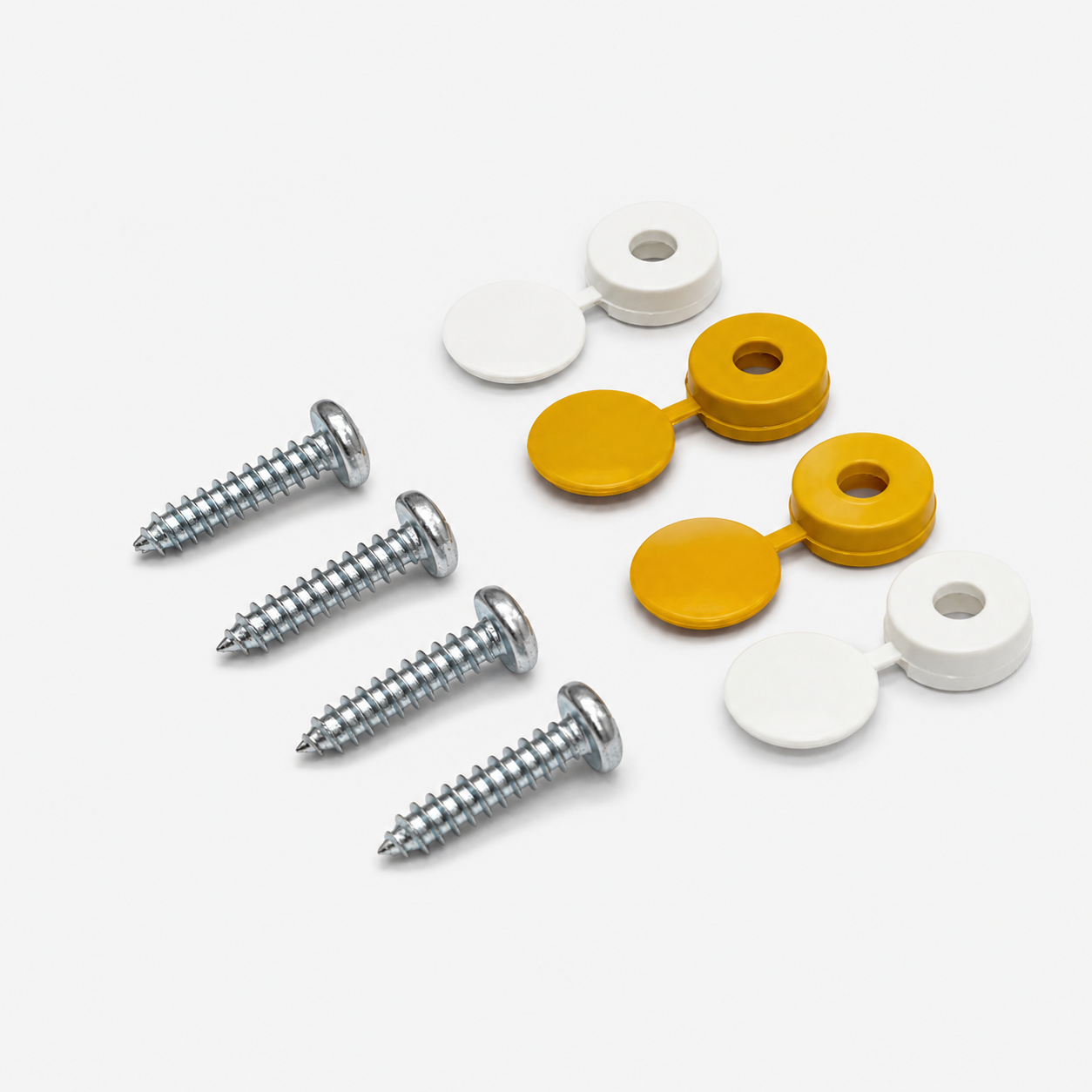 Screw fixing kit with four screws, white caps and yellow caps